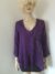 paars linnen jasje met lila stiksels